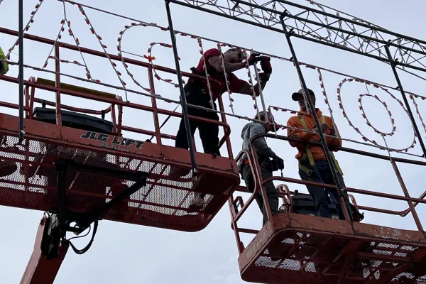 IBEW 159 members work on holiday lights