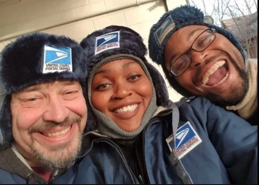 NALC member Aundre Cross with coworkers