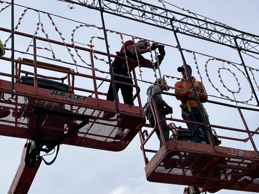 IBEW 159 members work on holiday lights